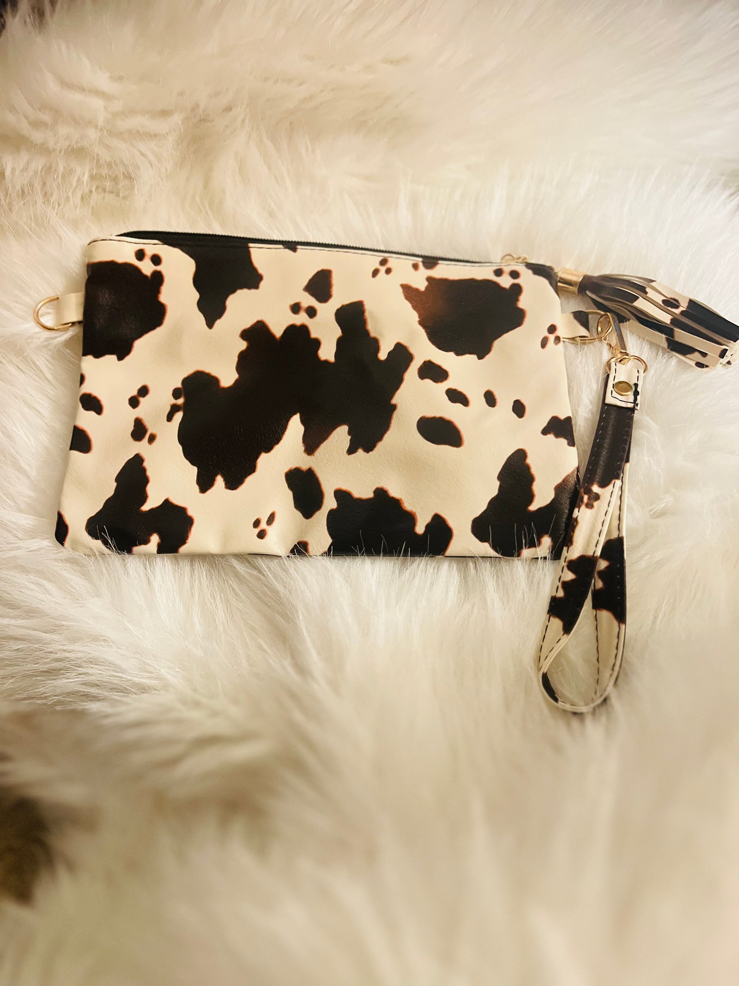 Cow Print Faux Leather Clutch with Tassel & Wristlet Strap